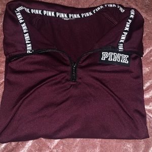black and maroon quarter zip.